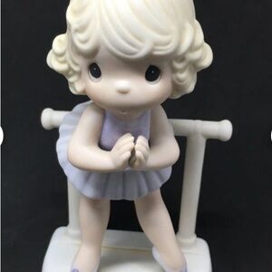 Precious Moments Cream and Purple Figurine. New with tag no box
